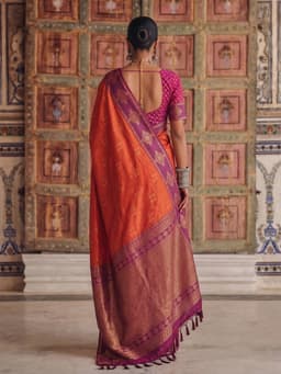 Orange Soft Silk Saree with Purple Woven Border